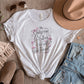 Empowering Quote Tee: 'She Outgrew the Version of Herself that Survived'